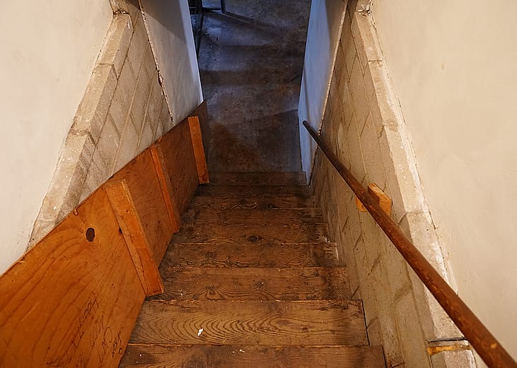 A staircase leading to an apartment basement.
