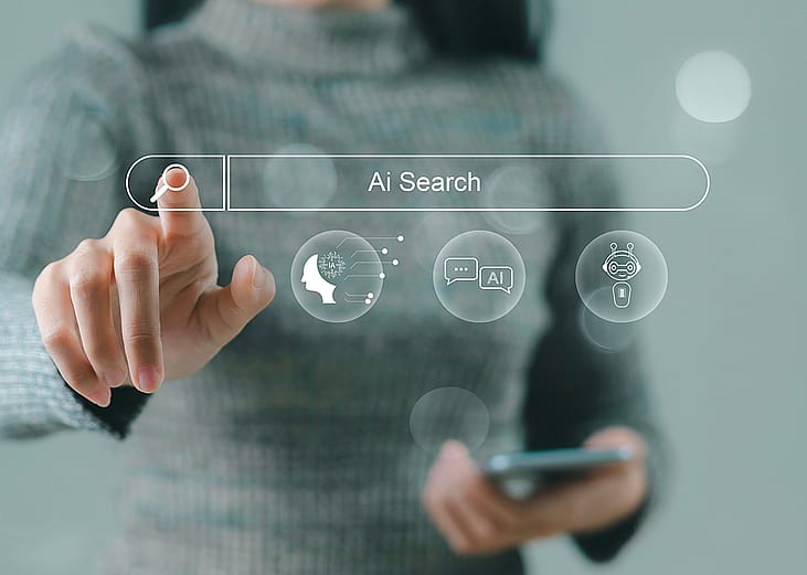 A businesswoman using a smartphone navigating a holographic AI search engine bar.