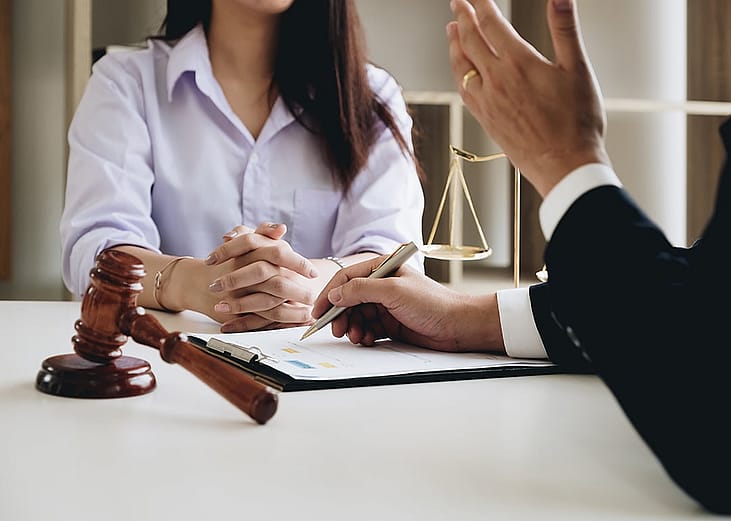 A female entrepreneur consulting with a lawyer.