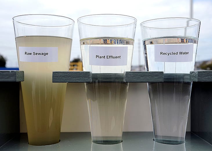 Three glasses of water showing results of reverse osmosis tubing.