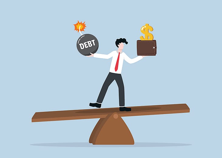 A vector illustration showing a person balancing on a seesaw of a debt bomb and a money wallet.