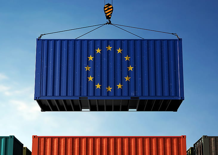 An azure blue freight container showing the European Union flag's 12 gold stars.