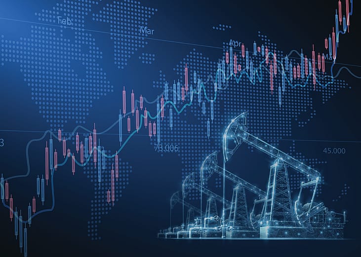 Stock and finance charts over a holographic illustration of oil pump infrastructure.