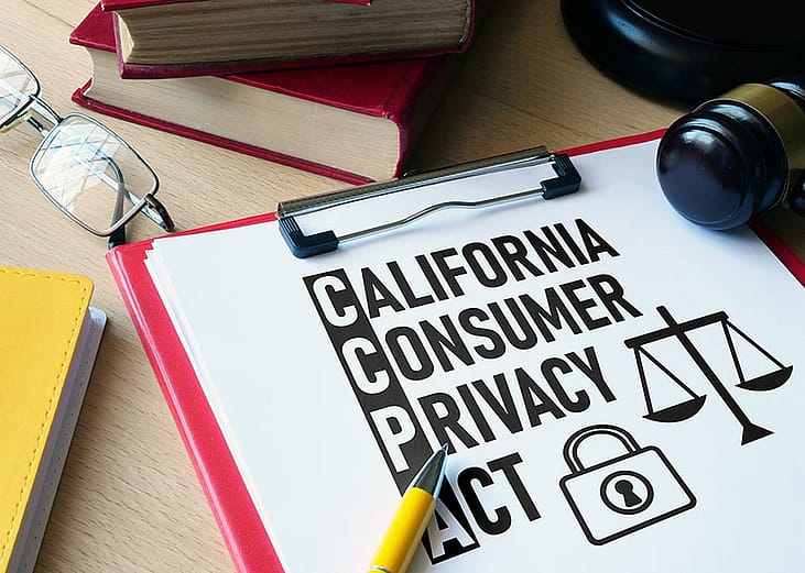 California Consumer Privacy Act on a paper with other legal materials. 