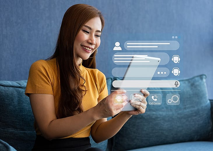 A young woman interacting with customer service illustrated with agentic AI software graphics.