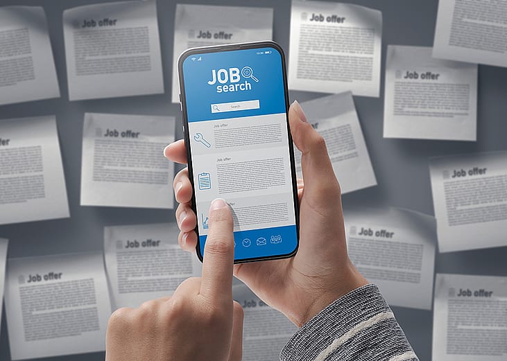 A person checking on job search app's posts from a smartphone.