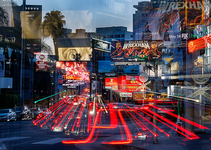 A slow exposure shot resulting in a mosaic of streaming car lights in a sea of billboards on Sunset Boulevard in West Hollywood.