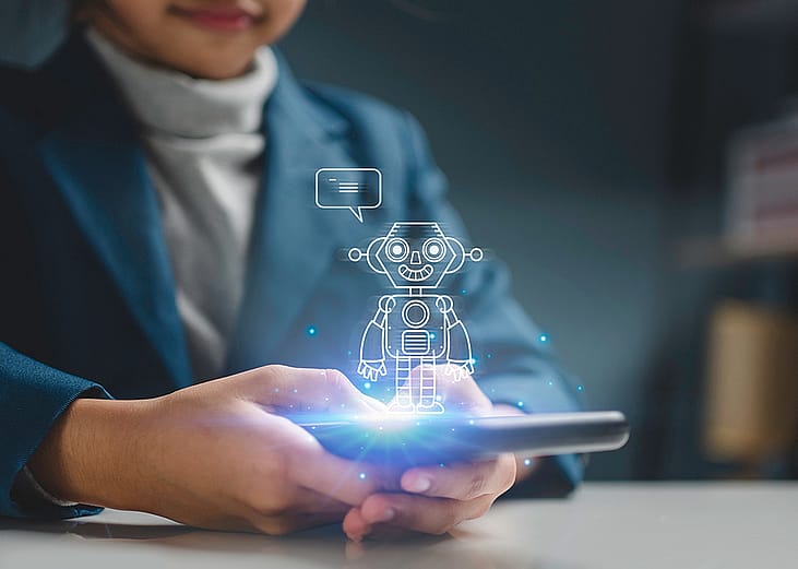 A young girl using a smartphone for learning illustrated with a AI chatbot graphics.