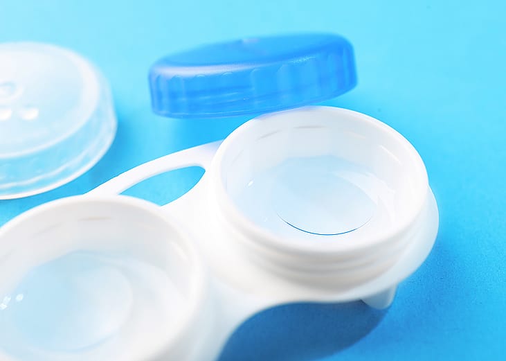 A contact lens case with contact lenses and soluton stored inside. 
