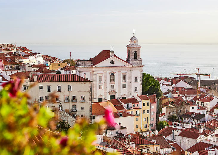A view of the old town's homes from Miradouro de Santa Luzia in Portugal.