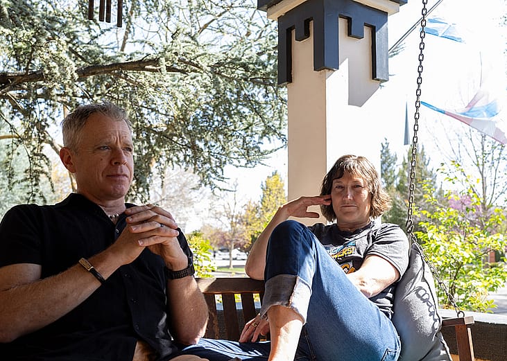 Michael and Dr. Angie Devitt taking their time for some reflection at a balcony.