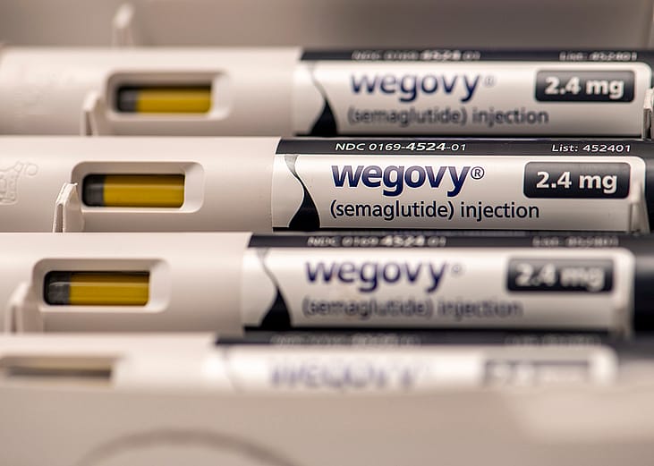 A stack of 2.4mg Wegovy injection pens