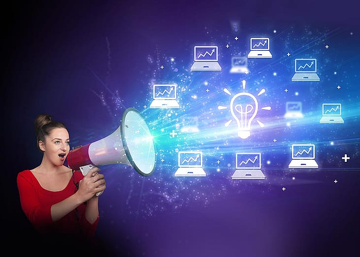 A young woman with a megaphone illustrated with shouting out business email graphics as a concept of marketing.