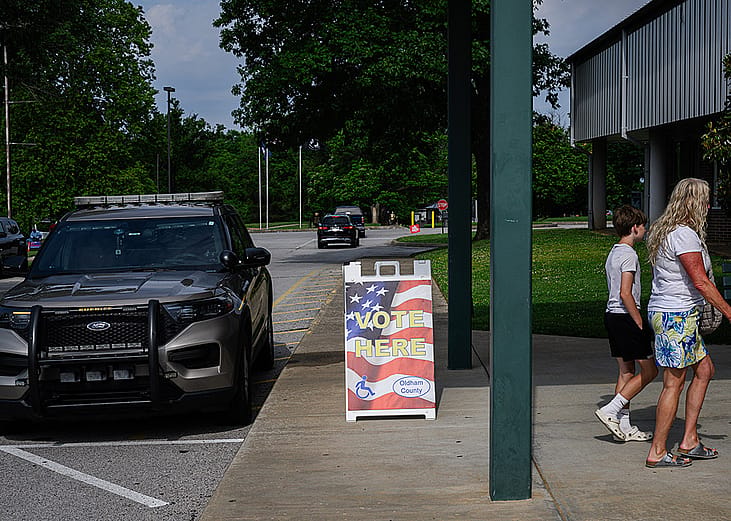 People heading to a polling place South Oldham Middle School in Crestwood, Kentucky, USA.