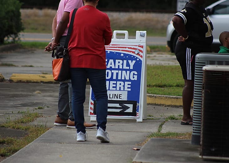 East Baton Rouge Parish, Louisiana, voters stand in line at an early voting location in 2022.