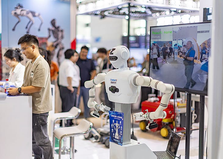 An exhibitor for AI and robot manufacturing during the 2026 World Intelligent Industry Expo in Tianjin, China.