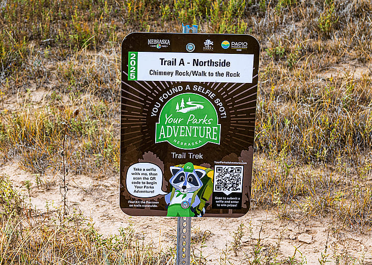A sign with a QR code on the trail at Chimney Rock National Historic Site in Nebraska