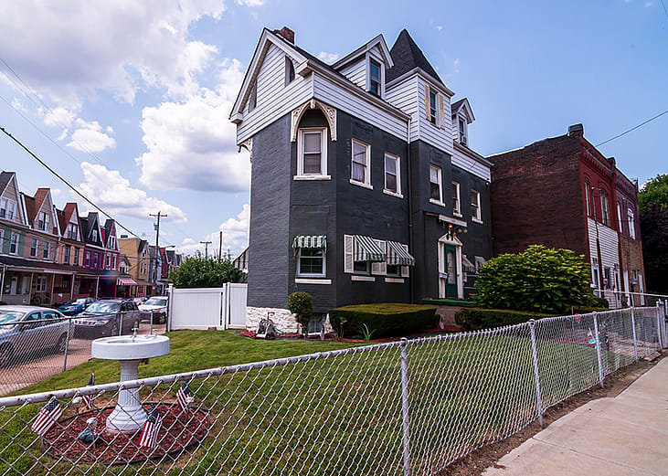 A three-story house built in 1929 and seen along Dawson Street in the south Oakland neighborhood in Pittsburgh, Pennsylvania, USA.