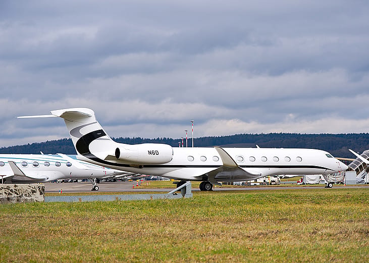 A parked Gulfstream G700 private jet at Zürich Airport in Switzerland.