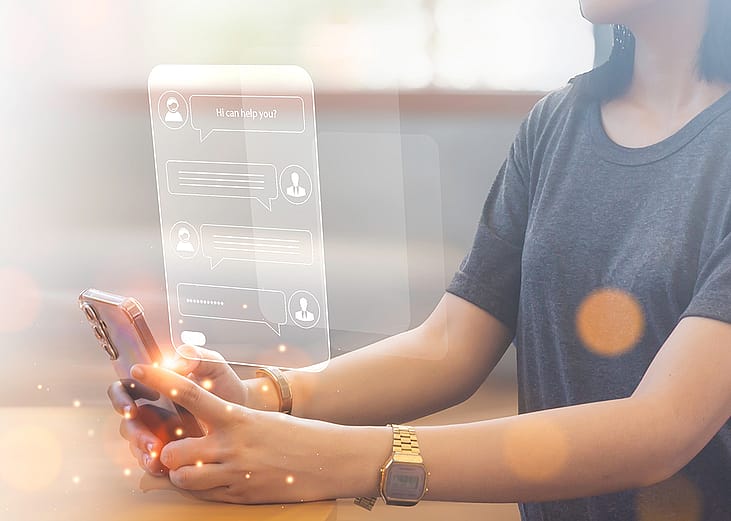 A young woman using a smartphone illustrated with AI chatbot conversations.