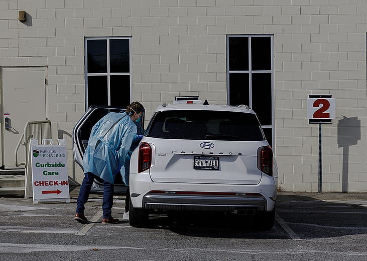 Parkside Pediatrics providers assessing a patient with measles symptoms in Spartanburg, South Carolina, USA.