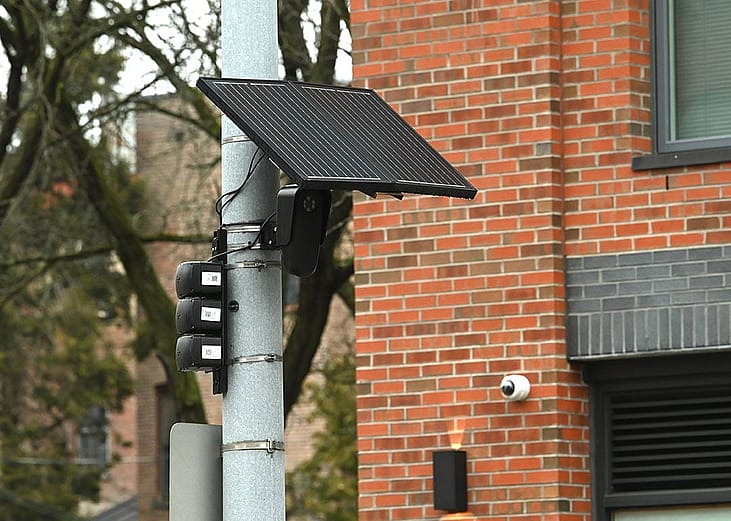 A Flock Safety camera is seen on the corner of River Street and Congress Street in New York.