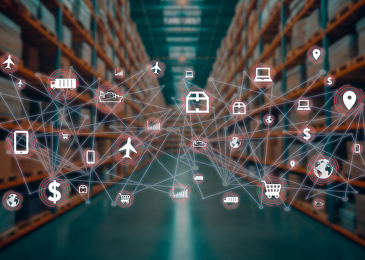 Global distribution concept icons connected together with a product warehouse in the background.