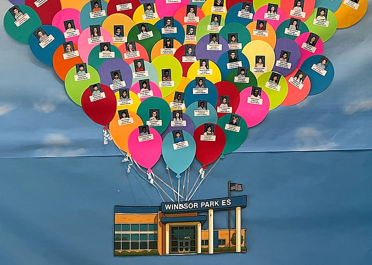 Windsor Park Elementary students are pictured on the school’s Millionaires Club display, which recognizes children who read at least one million words during the school year.