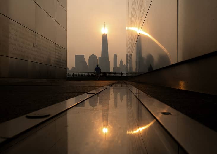 A wildfire smoke from Canada seen behind the lower Manhattan skyline and One World Trade Center in New York City, USA.