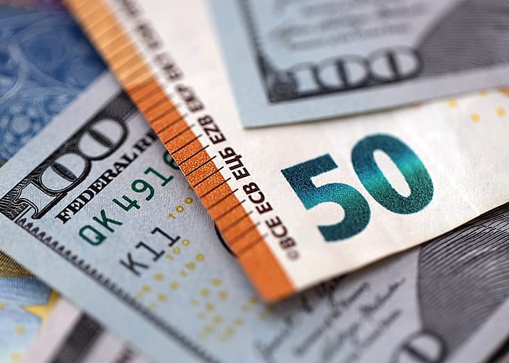 US dollar and Euro banknotes as a concept of currency exchange.