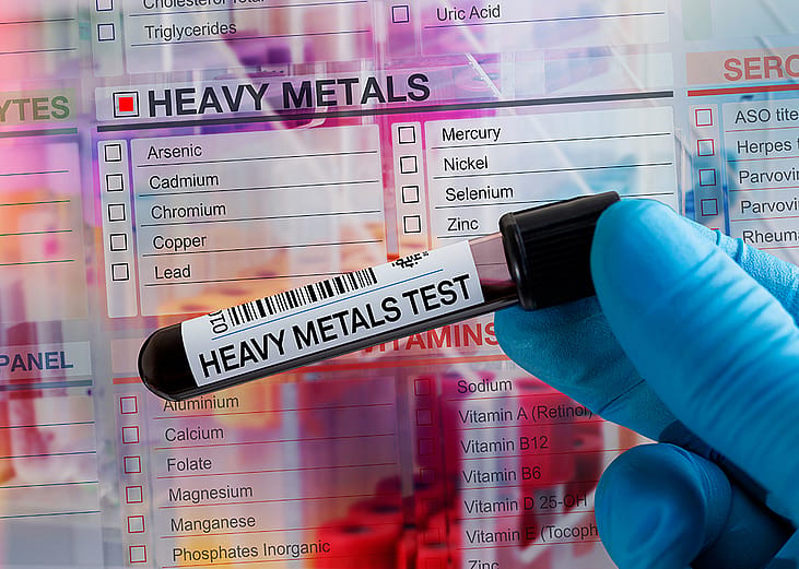 A blood sample tube collected for heavy metals test in a laboratory.