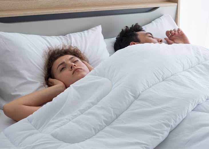 Woman having a hard time sleeping.