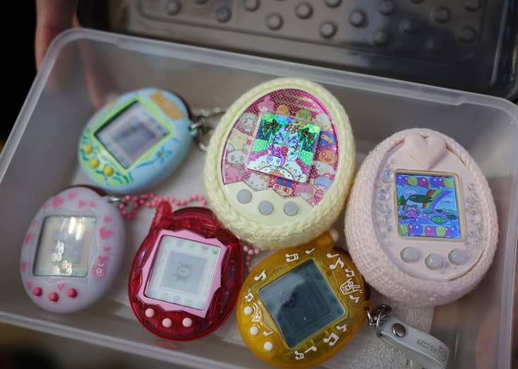 A collection of Tamagotchis shown from a storage box. 