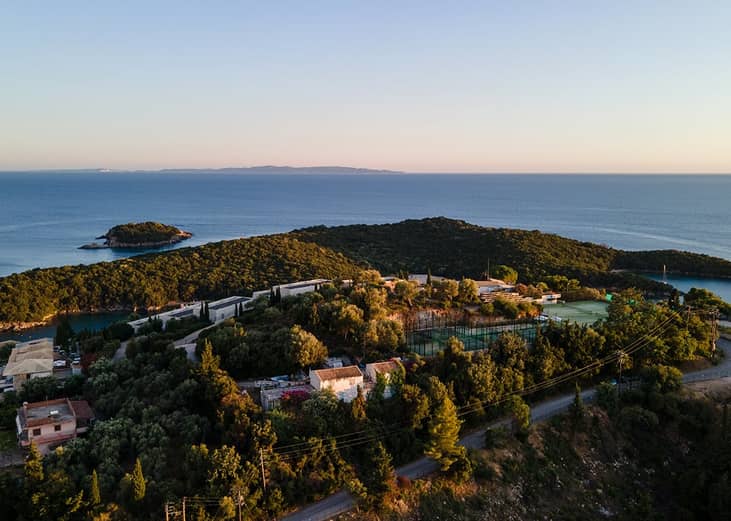 An aerial view of high-end residential houses in an island town of Syvota, Greece.