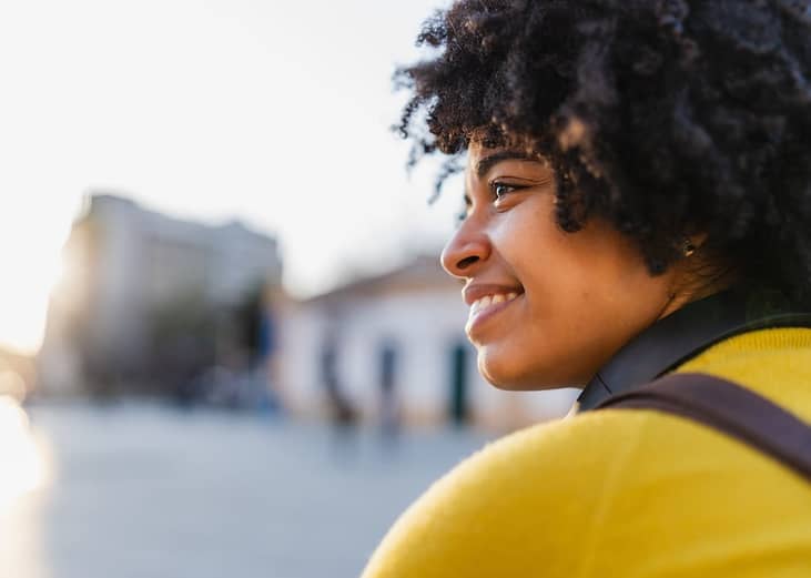 A young woman enjoying the city view.