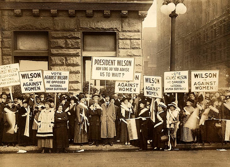 A 1916 photograph of suffragists demonstrating against U.S. President Woodrow Wilson, Chicago, Illinois, USA, Burke & Atwell, October 1916 Suffragists demonstrating against U.S. President Woodrow Wilson, Chicago, Illinois, USA, Burke & Atwell.