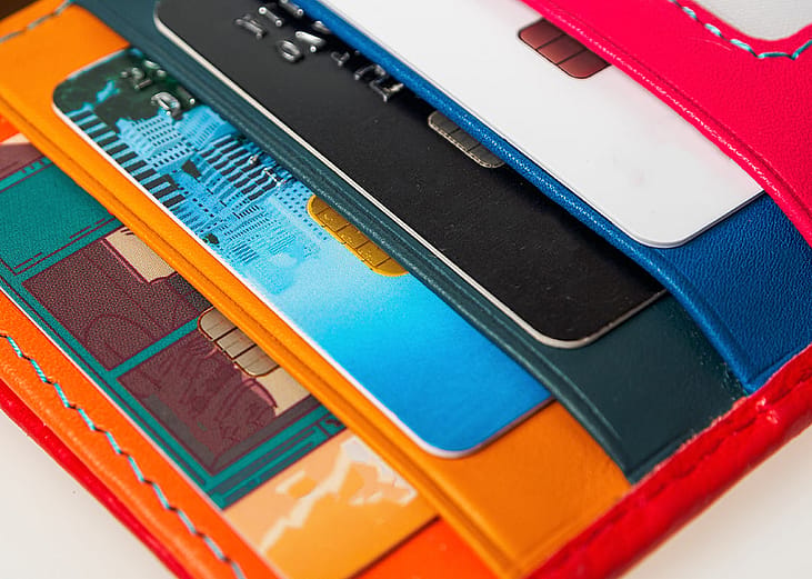 A collection of credit cards inside a wallet.