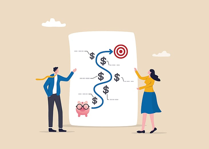 An illustration of two people reviewing a roadmap from a savings target to a financial milestone.