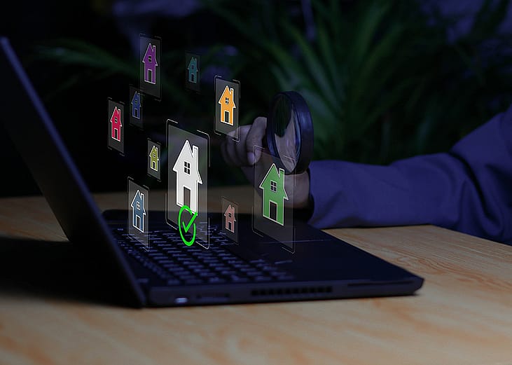 Business professional inspecting digital property verification with virtual house icons.
