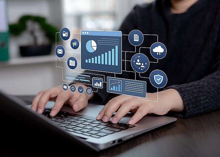 Business professional using an analytics dashboard interface