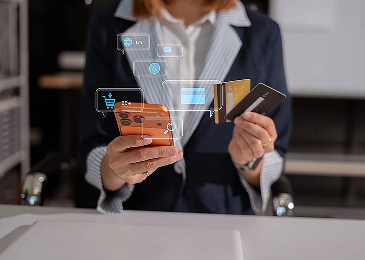 A finance officer assessing a few business credit cards for their company.