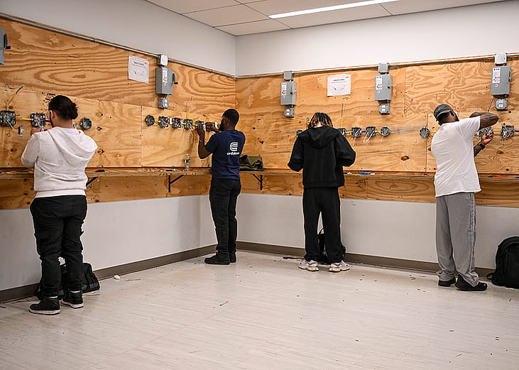 Students participating in an Advanced Electrical program's class at Apex Technical School in Manhattan, New York, USA.