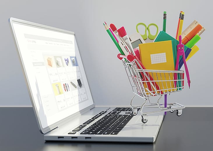 School supplies and stationery for sale in an online shopping website's cart from a laptop.