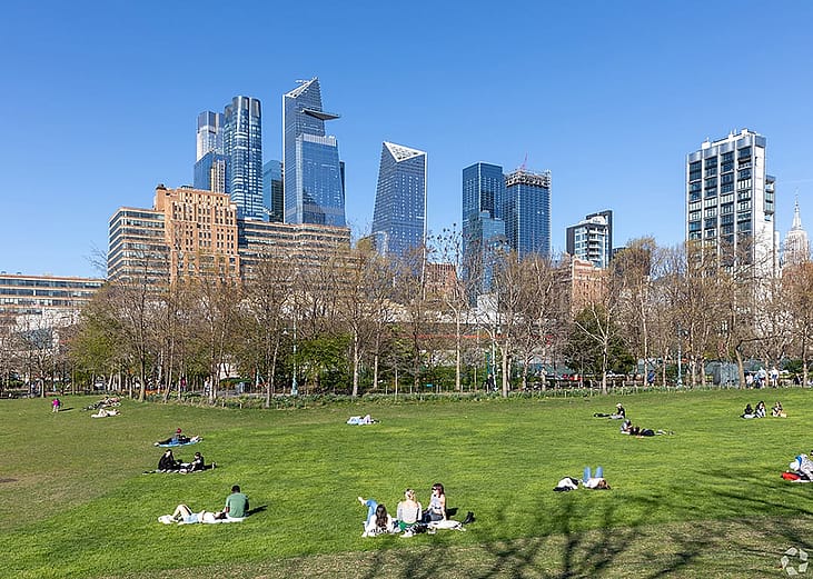 View of a city skyline from a park.