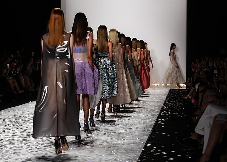 Models line up on the runway during a show for New York Fashion Week.