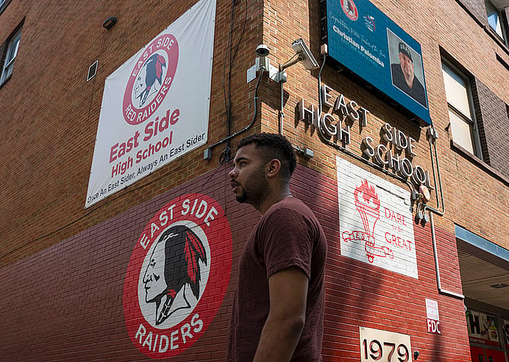 Bruno poses for a picture outside East Side High School in Newark, New Jersey.