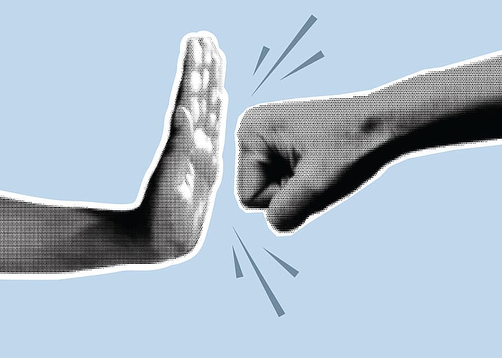 A custom illustration of an open hand making a stop gesture to block a clenched fist, symbolizing resistance against violence.