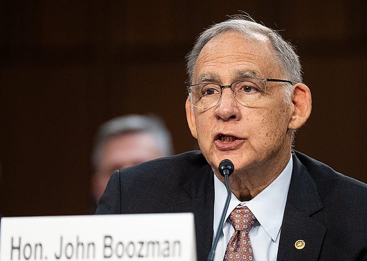 U.S. Senator John Boozman introducing a district judge nominee during a confirmation hearing in the Senate Judiciary Committee.
