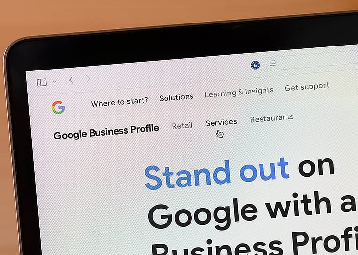 A Google Business Profile website displayed from a laptop's screen.