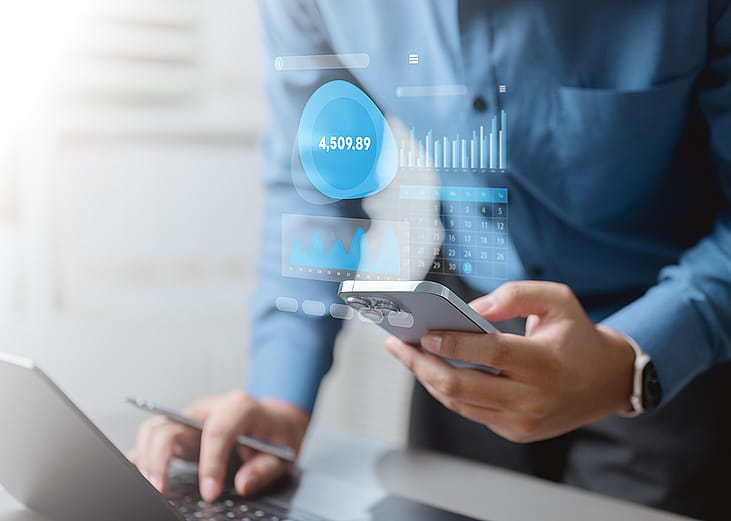 Businessman using digital personal finance management, expense tracking, and mobile banking.